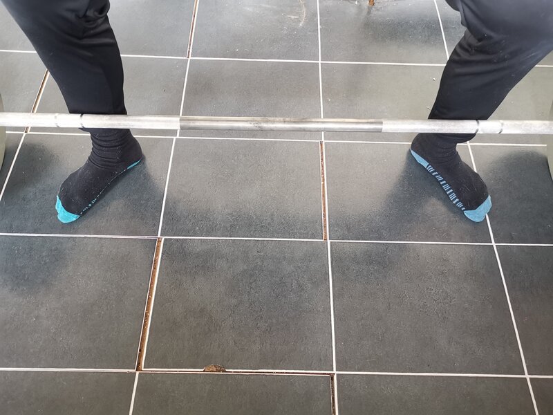 Wide stance for Sumo squat with feet pointing out at 45º